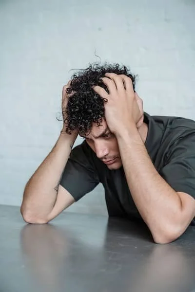 man upset and self critical
