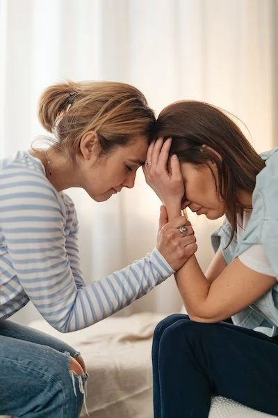 Two friends that are sad and in pain