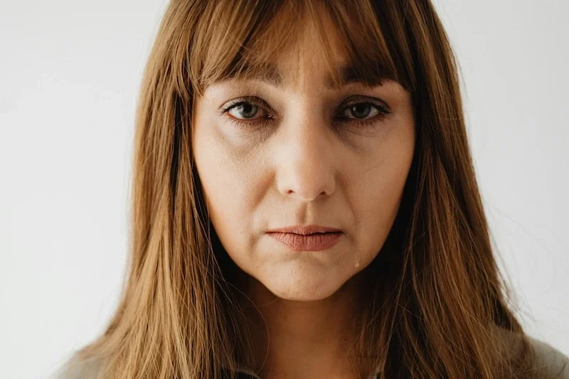 a woman looking depressed