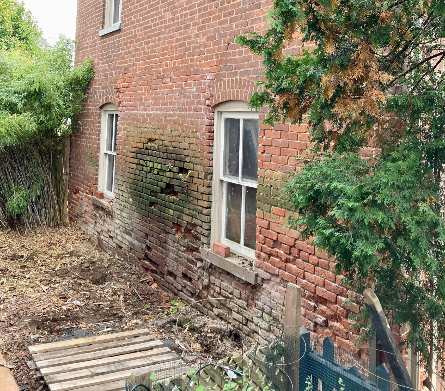 Spalling Brick, Open Mortar Joints, And Moisture Damage