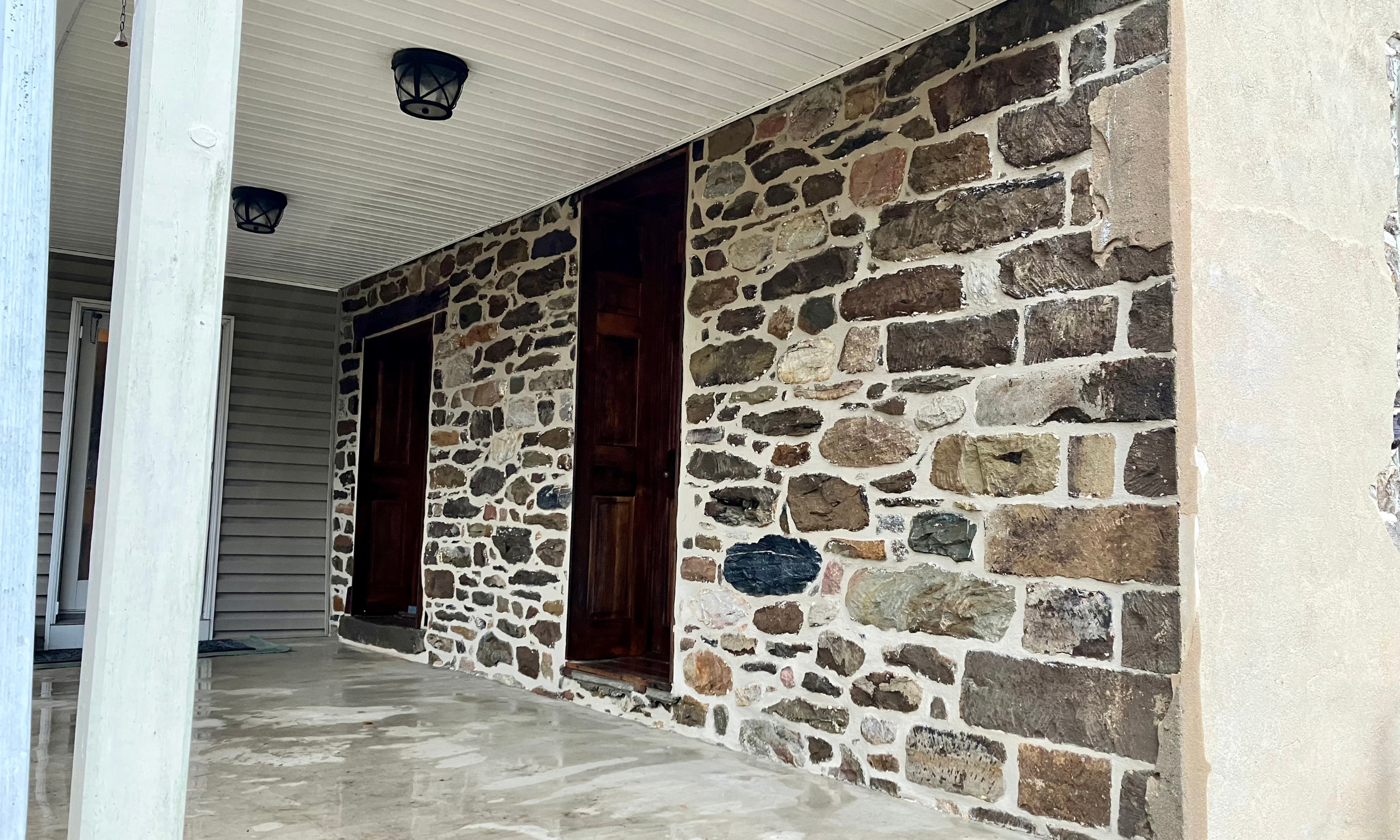 Historic stone farmhouse repointing using lime mortar