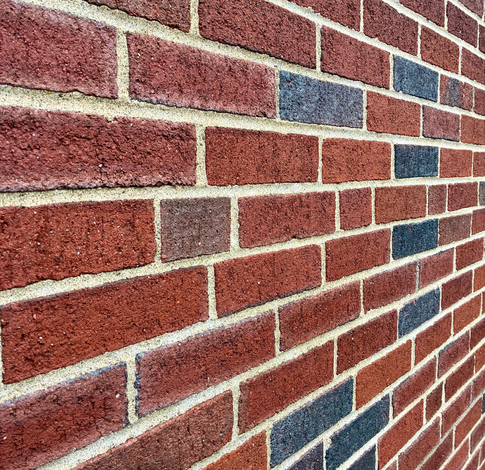 Close-up of expertly matched mortar joints after repointing