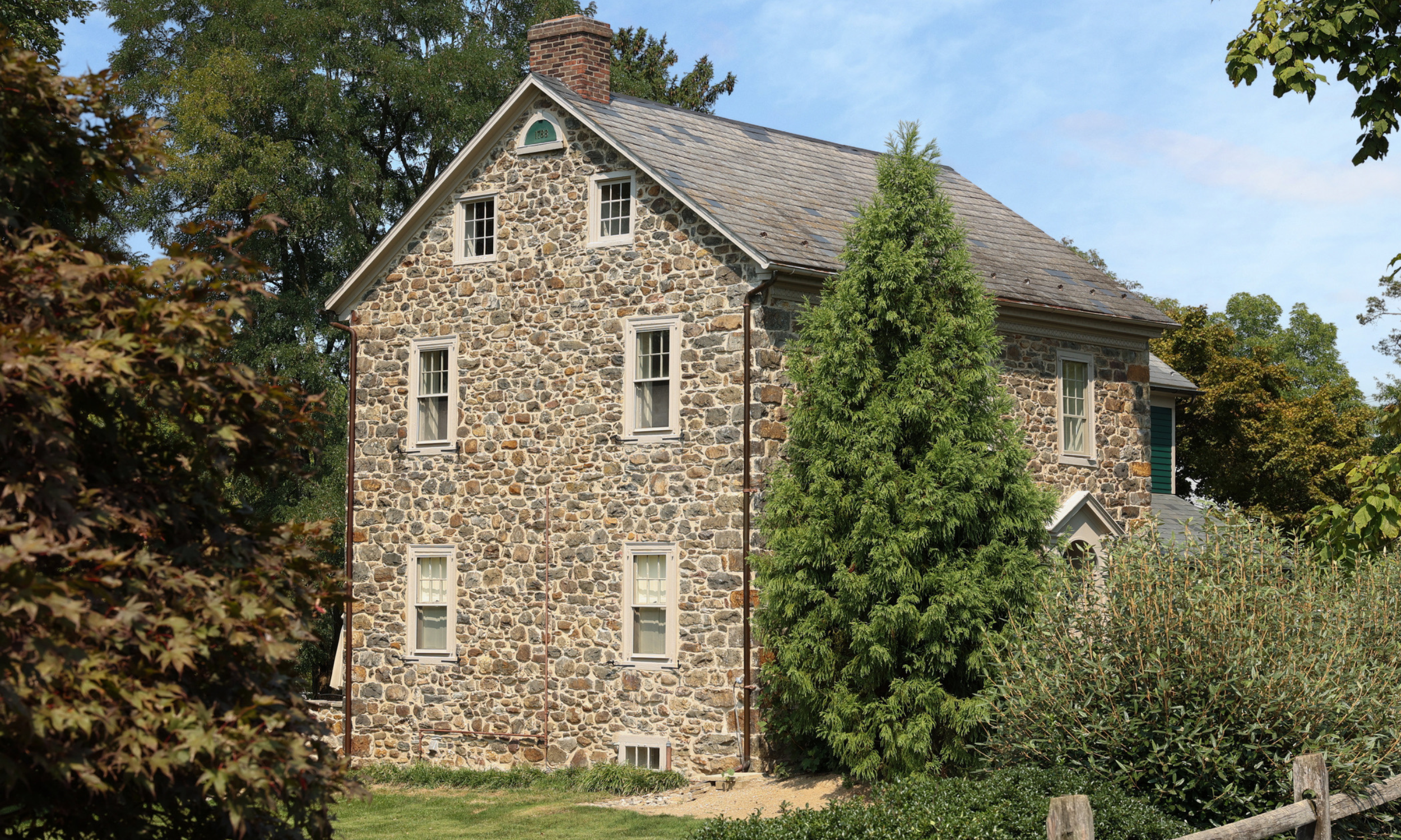 Natural stone repointing on a stone farmhouse using lime mortar