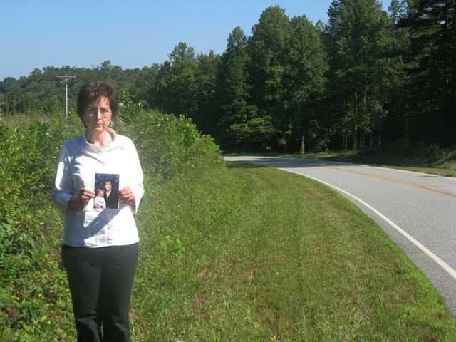 Jo Ann stands where Kristi was abducted.jpg