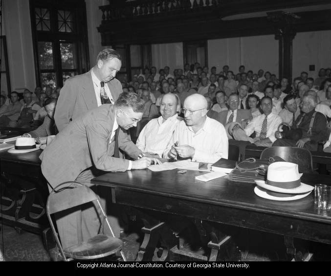 Defendant John Wallace's lawyers Fred New and Jack Allen, with accomplice Henry Mobley during trial, 1948 .jpeg