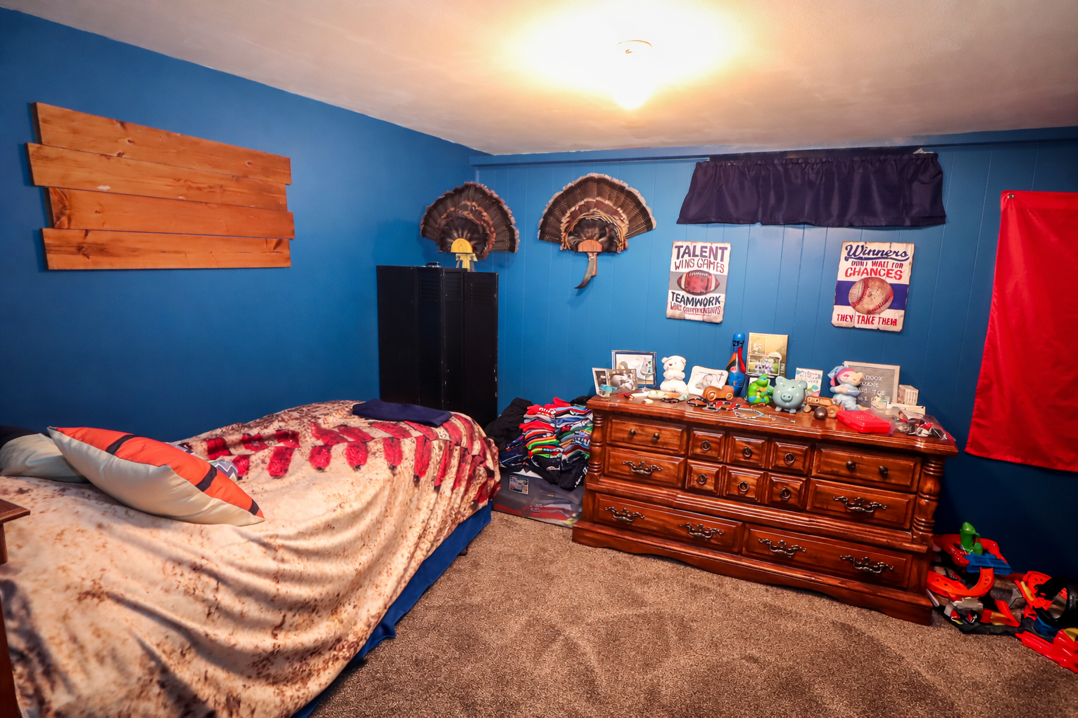 Sporty and cozy teen bedroom.png