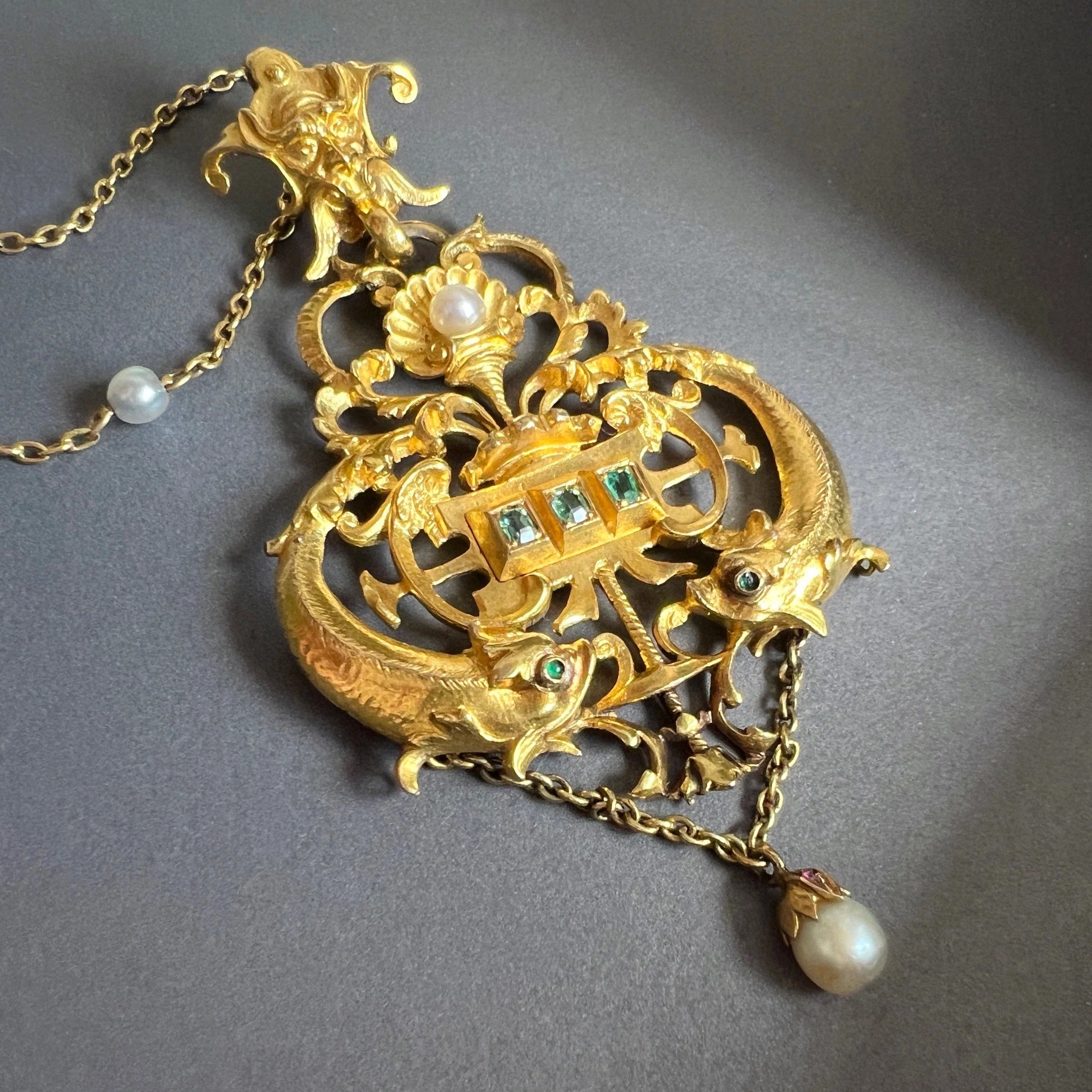 (SOLD) Antique Victorian Renaissance Revival Gold and Emerald Pendant with Twin Dolphins (with chain)
