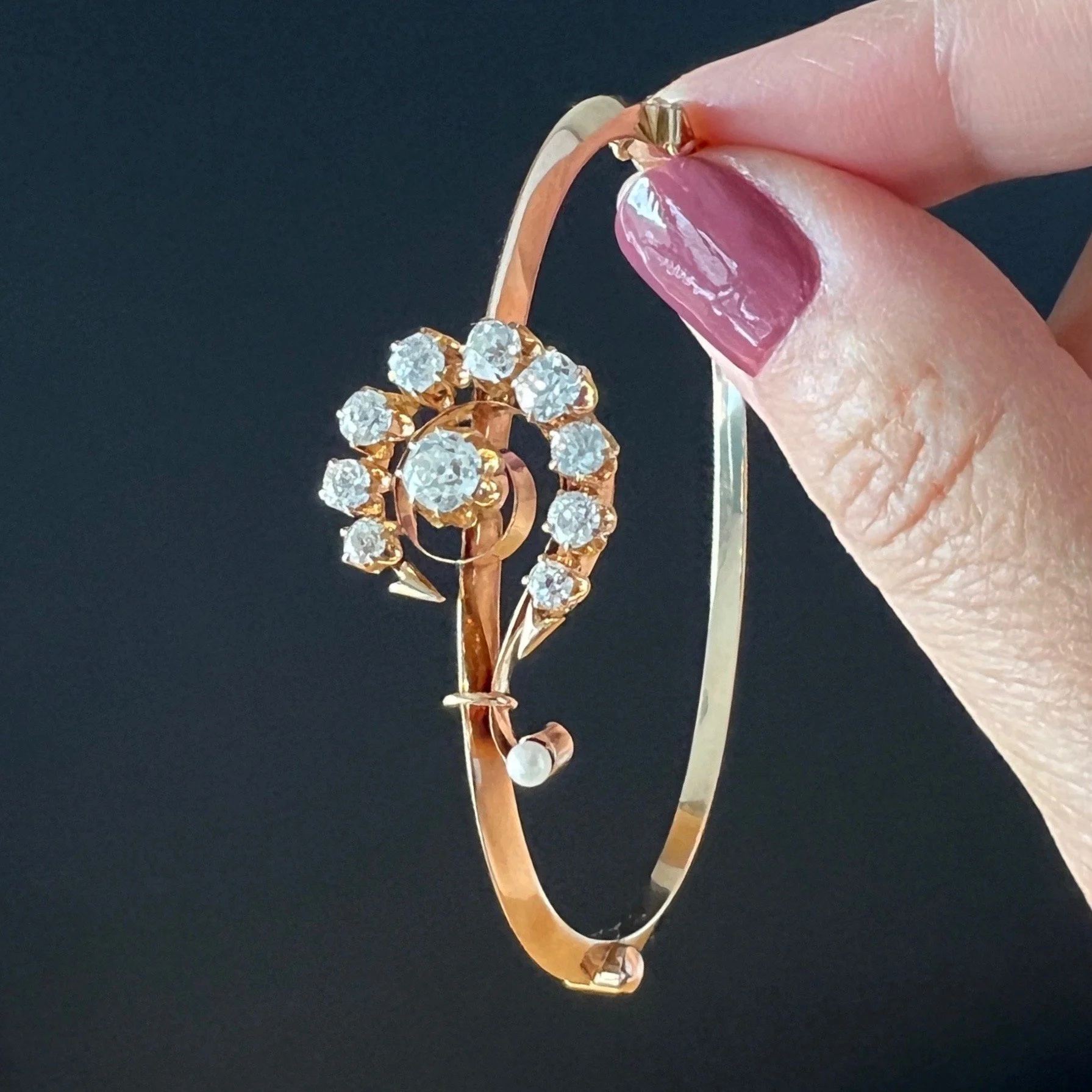 Antique Early 20th Century Diamond and Pearl Question Mark Hinged Gold Bangle