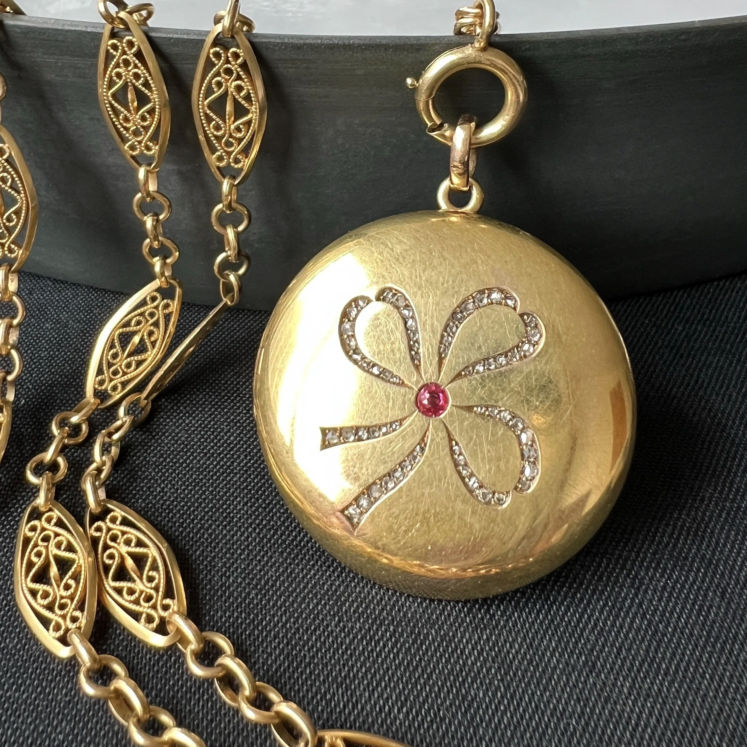 (SOLD) Antique Edwardian Large Gold Round Locket with Diamond Ribbon Bow Motif
