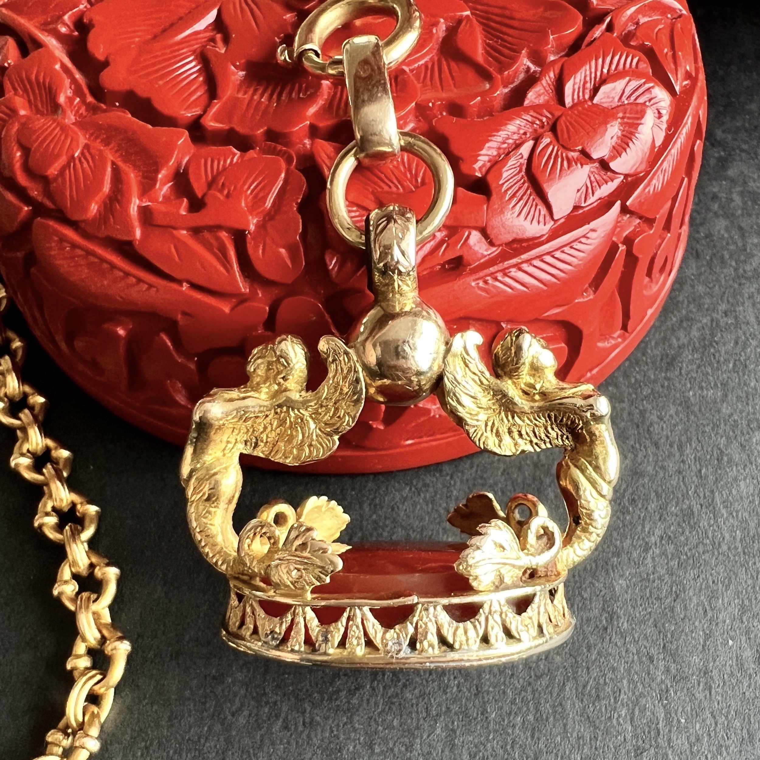 Edit Antique French Early 19th Century Gold and Carnelian Seal Fob with Winged Sirens