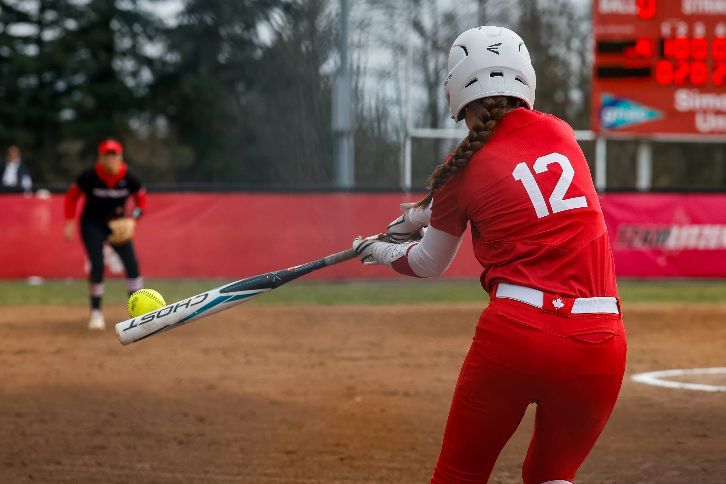 Simon Fraser University vs. Northwest Nazarene University in a GNAC conference regular season softball game.