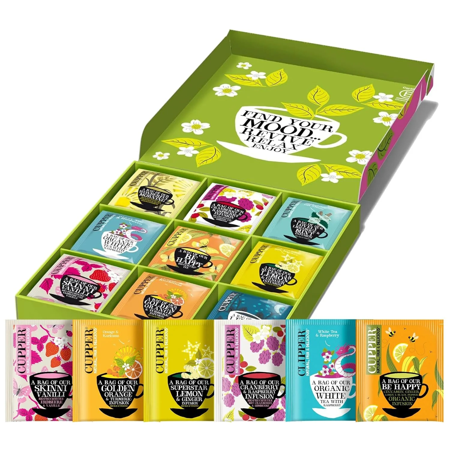 Geöffnete, grüne Cupper Tee-Geschenkbox mit neun Fächern. Darin und davor aufgereiht liegen bunt verpackte Teebeutel in vielfältigen Sorten.