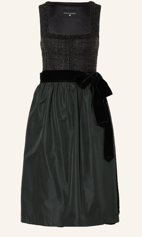Dirndl mit dunklem, fein schimmerndem Bouclé-Mieder und quadratischem Ausschnitt, schwarzer Samtschleife an der Taille und fließendem, dunkelgrünem Taftrock.