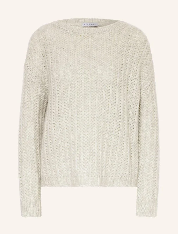 Gemütlicher Grobstrick-Pullover in der Trendfarbe 2026 „Cloud Dancer“. Der weiche Strickpulli in hellem Off-White überzeugt durch seine strukturierte Oberfläche und den entspannten Schnitt – ein Must-Have für kuschlige Winter-Outfits.
