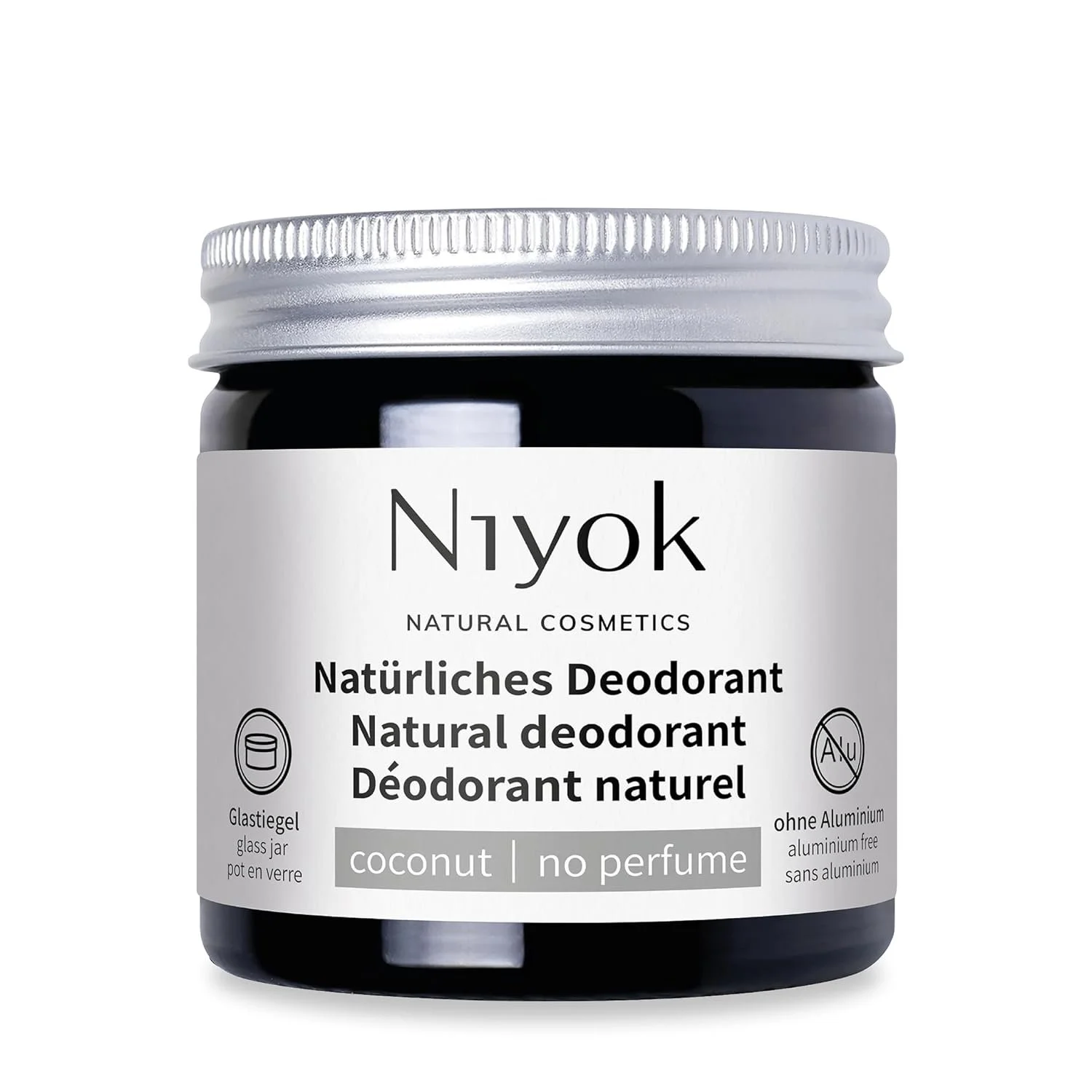 Glastiegel mit silbernem Schraubdeckel von niyok, Etikett zeigt „Natürliches Deodorant", Duftrichtung Kokos ohne Parfum und den Hinweis „ohne Aluminium".