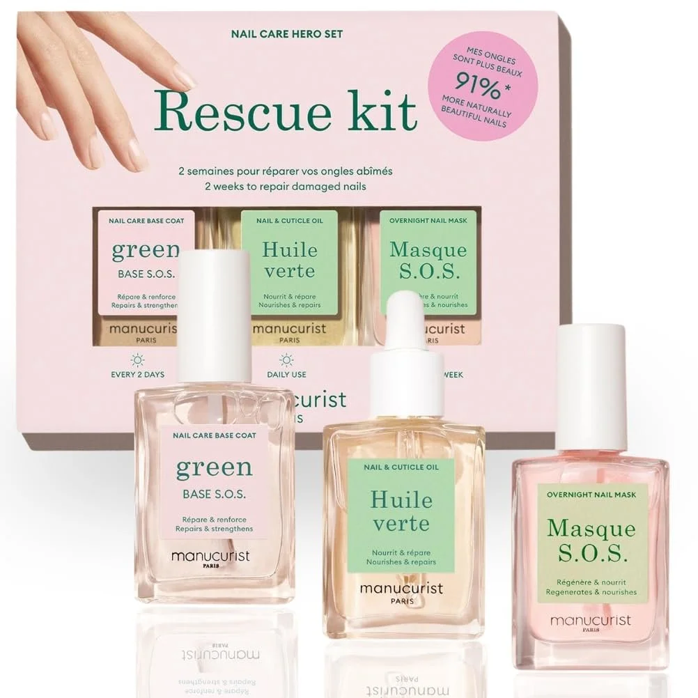 Nagelfürsorge-Set „Rescue kit“ von Manucurist in rosa Karton mit Hand-Motiv. Davor drei Glasfläschchen mit weißer Kappe: „green BASE S.O.S.“, „Huile verte“ (Öl) und „Masque S.O.S.“ (Maske).