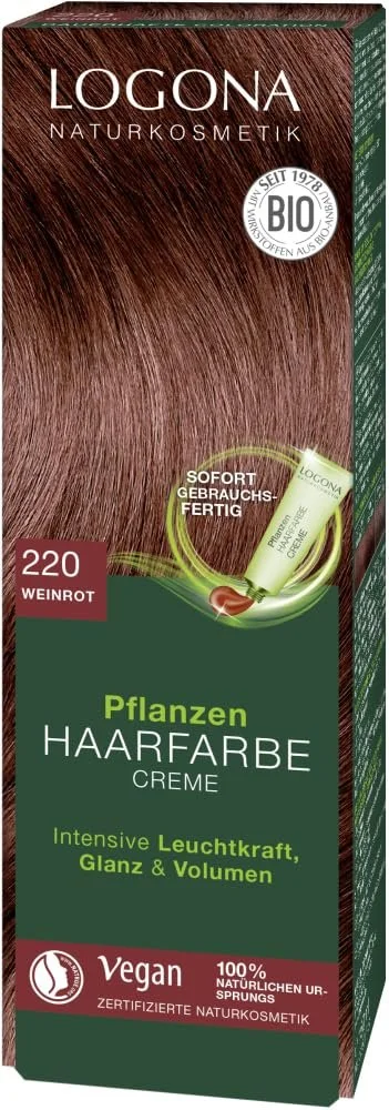 Dunkelgrüne Verpackung der Logona Pflanzen Haarfarbe Creme, Farbton 220 Weinrot, mit Foto von glänzendem rotbraunem Haar.