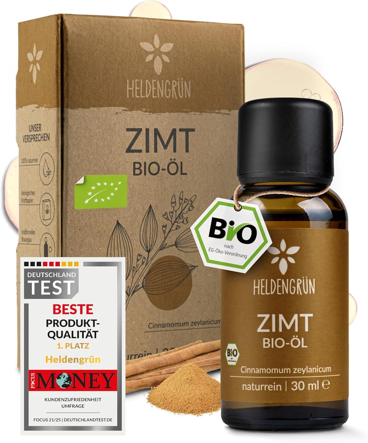 HeldenGrün Zimt Bio-Öl (30ml) in brauner Glasflasche neben dazugehöriger Pappverpackung und "Deutschland Test"-Siegel.