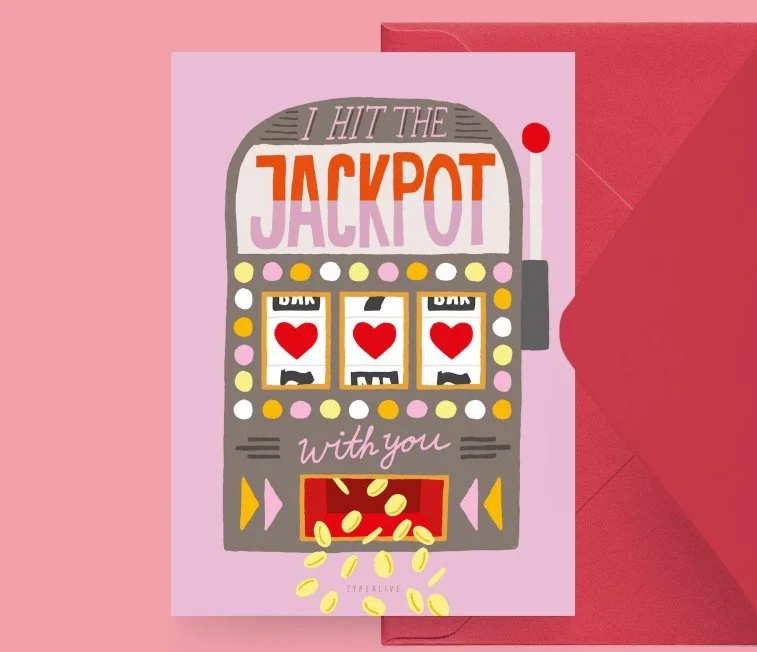 Illustrierte Grußkarte mit einem Spielautomaten, drei Herz-Symbolen im Display und dem Schriftzug „I hit the jackpot with you“ vor einem roten Umschlag.