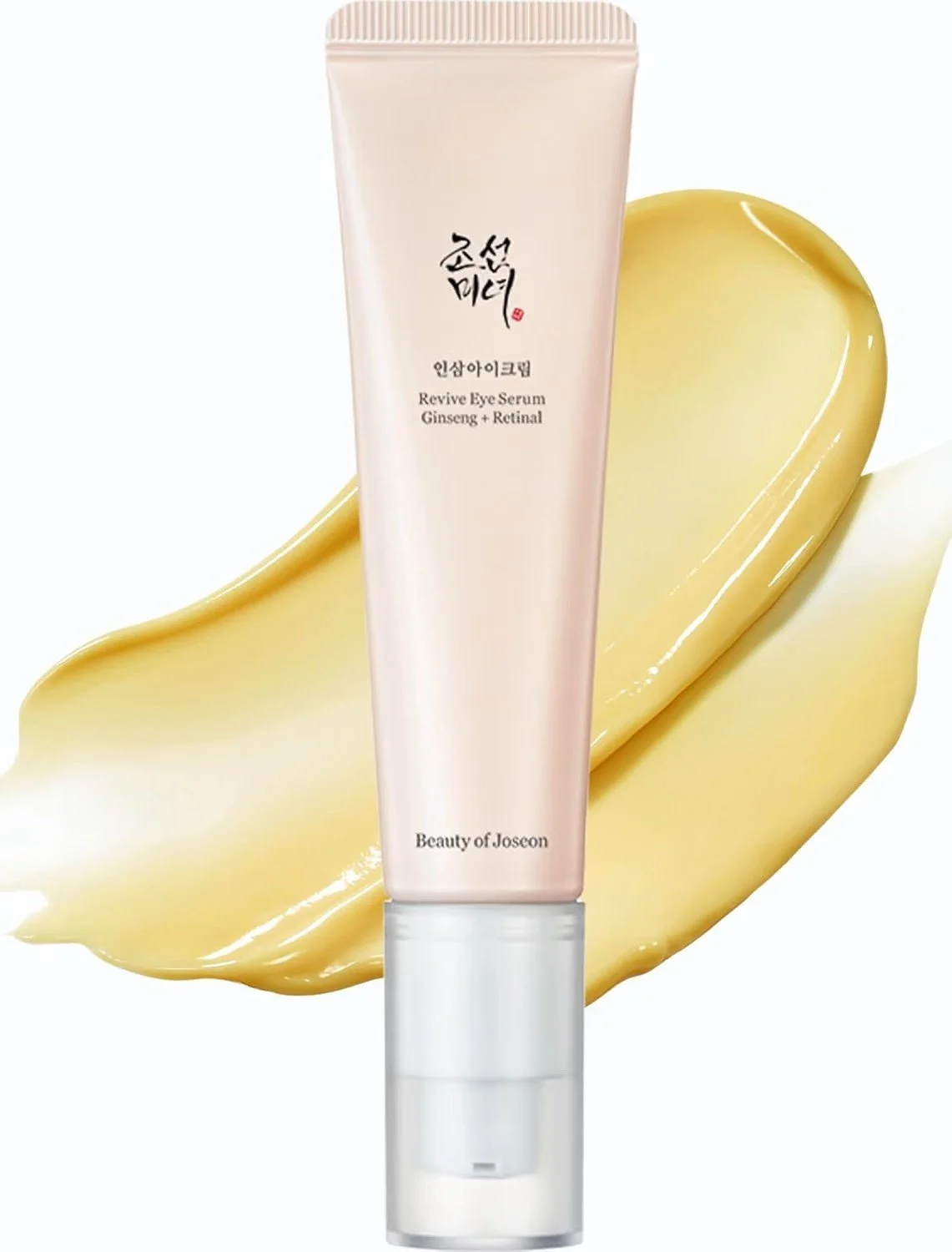 Beauty of Joseon Revive Eye Serum Ginseng + Retinal: rosafarbene Tube vor goldgelbem Textur-Swipe der Serum-Konsistenz