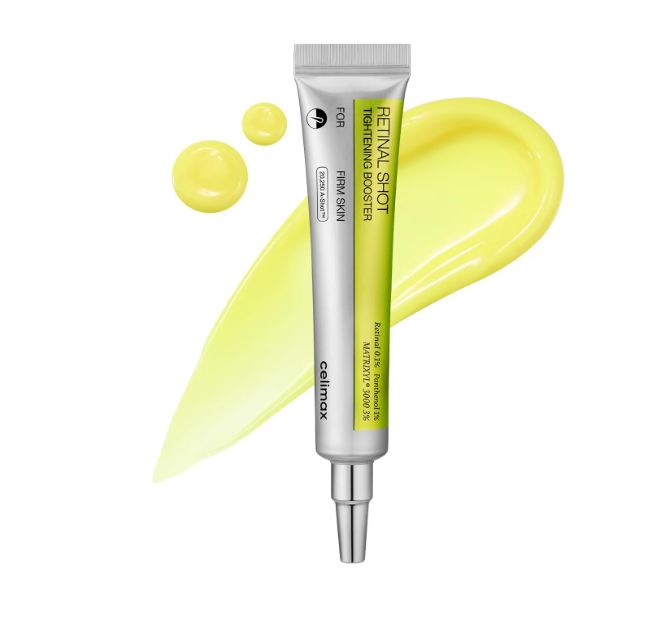 Celimax The Vita A Retinal Shot Tightening Booster in silberner Tube vor weißem Hintergrund, daneben ein gelber, cremiger Texturabstrich des Serums mit zwei Produkttropfen.