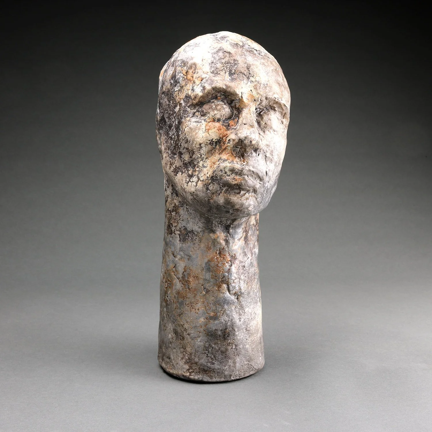 Textured ceramic figurative sculpture exploring reflection and quiet contemplation through form and gesture by Lisa Hilton