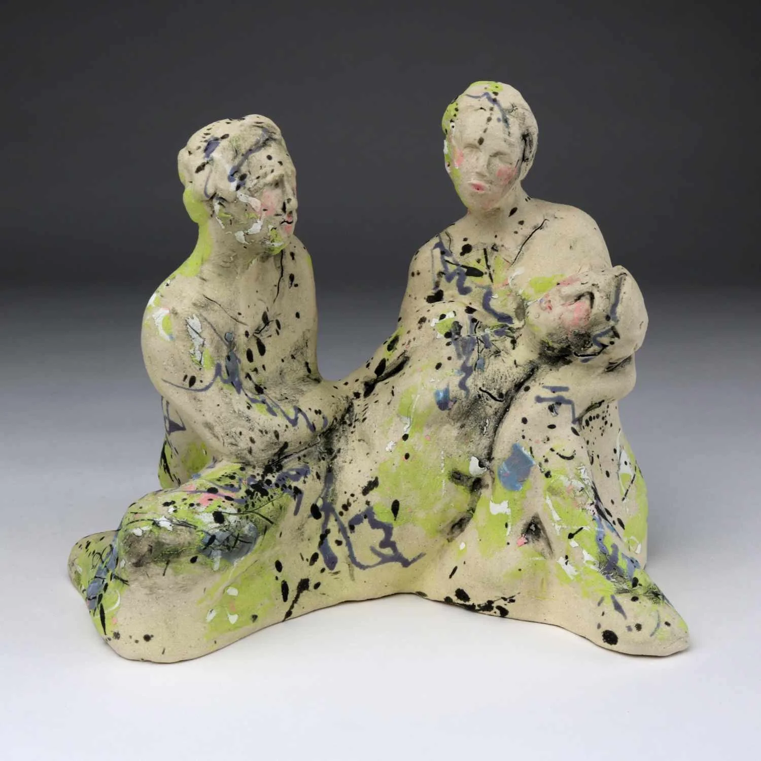 Textured ceramic multi-figure sculpture exploring connection and shared experience by Lisa Hilton