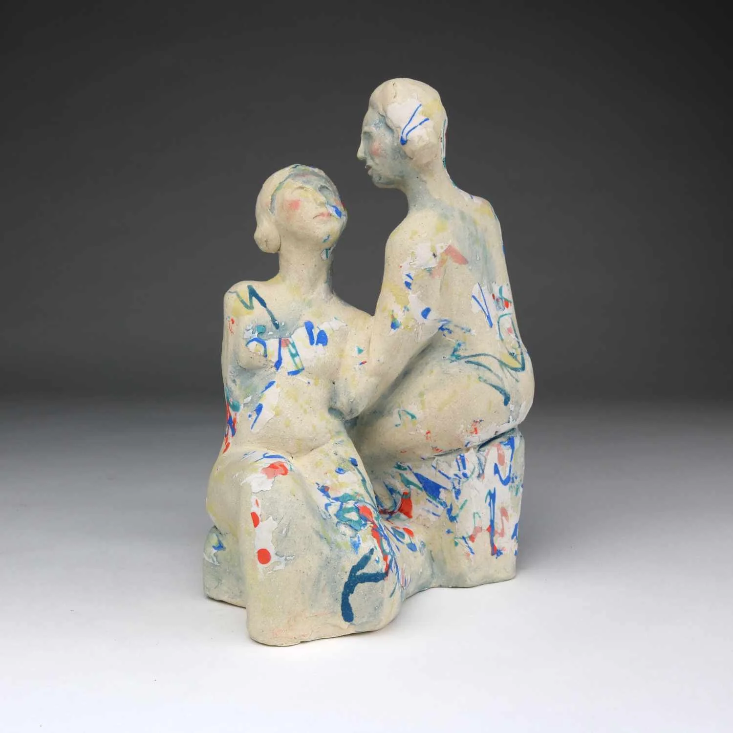 Listening, a multi figure ceramic sculpture by Lisa Hilton with soft color shifts and shared posture from the Women in Conversation collection