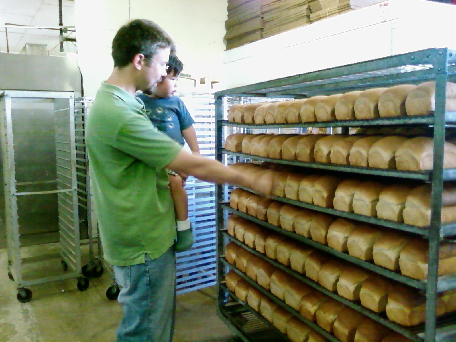 ABout Us, Dave's story-2009 -Kalei and Dave-cooling bread.jpg