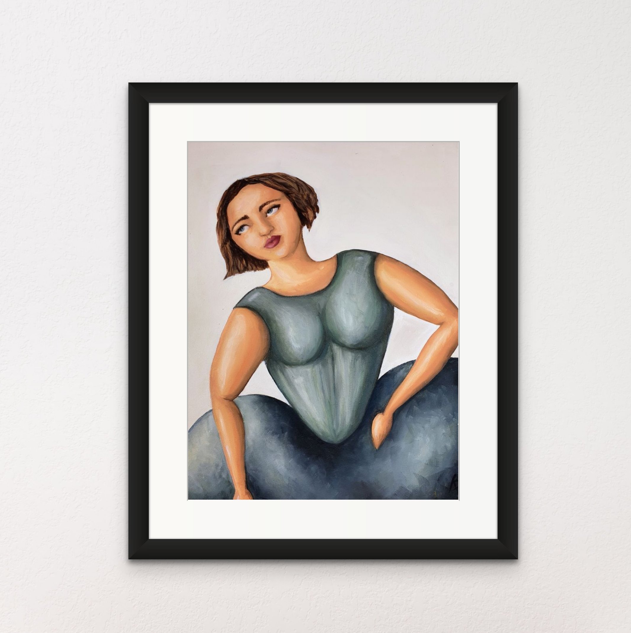 woman in green blank wall frame.jpg