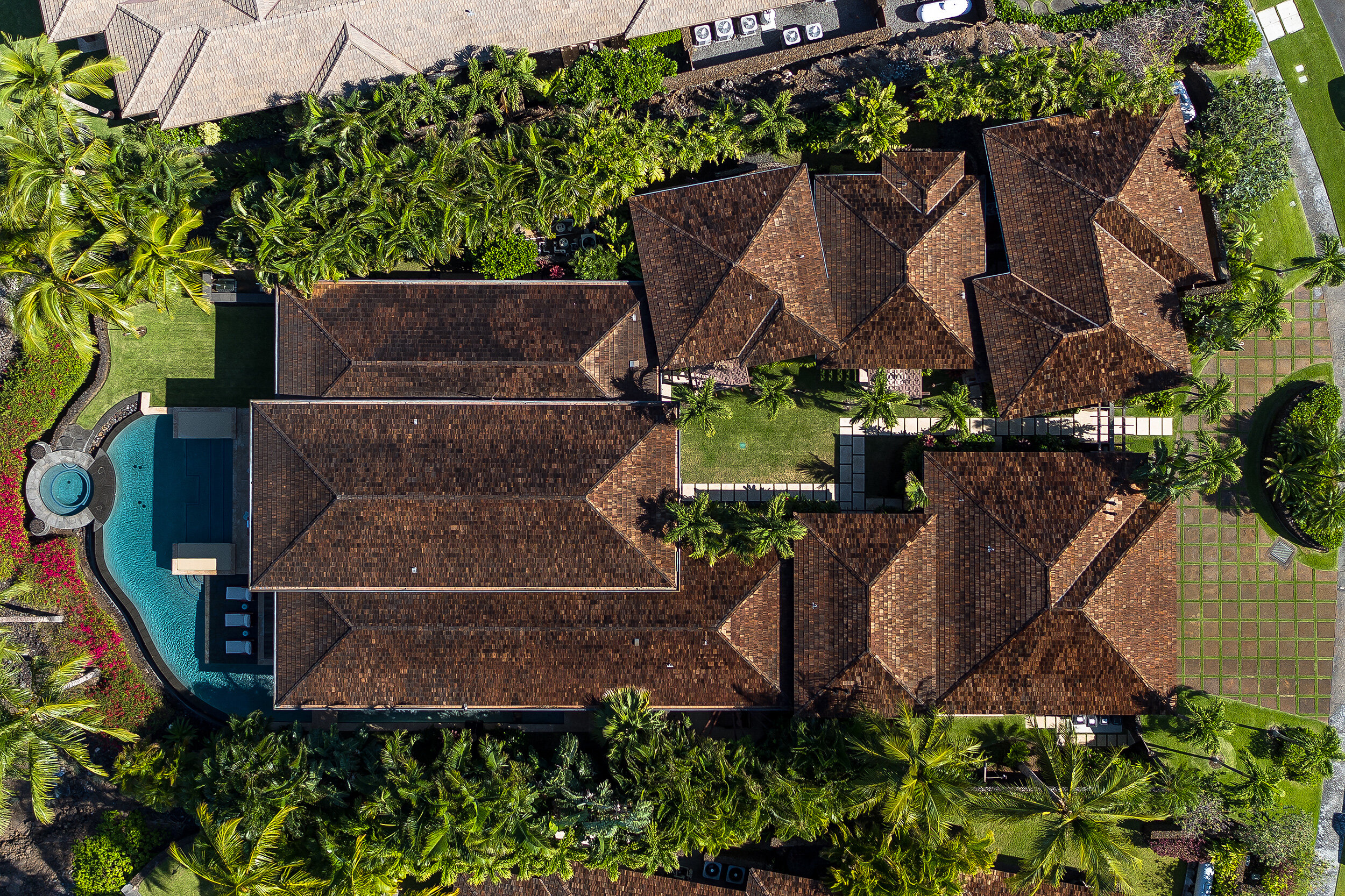 Gated touch pad entry into a private courtyard creates exclusive privacy.