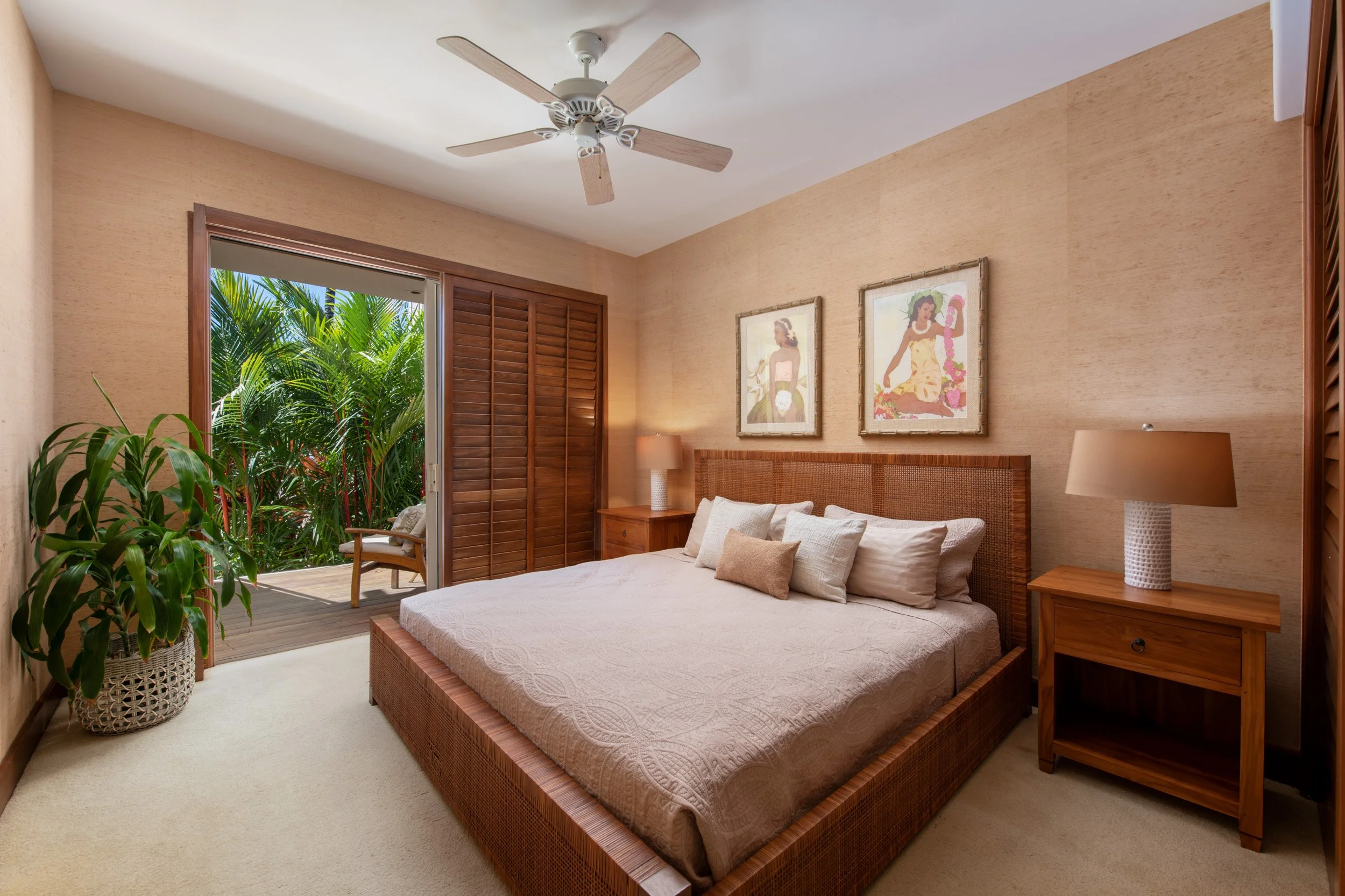 Lower-level secondary bedroom with a private lanai and full bathroom.