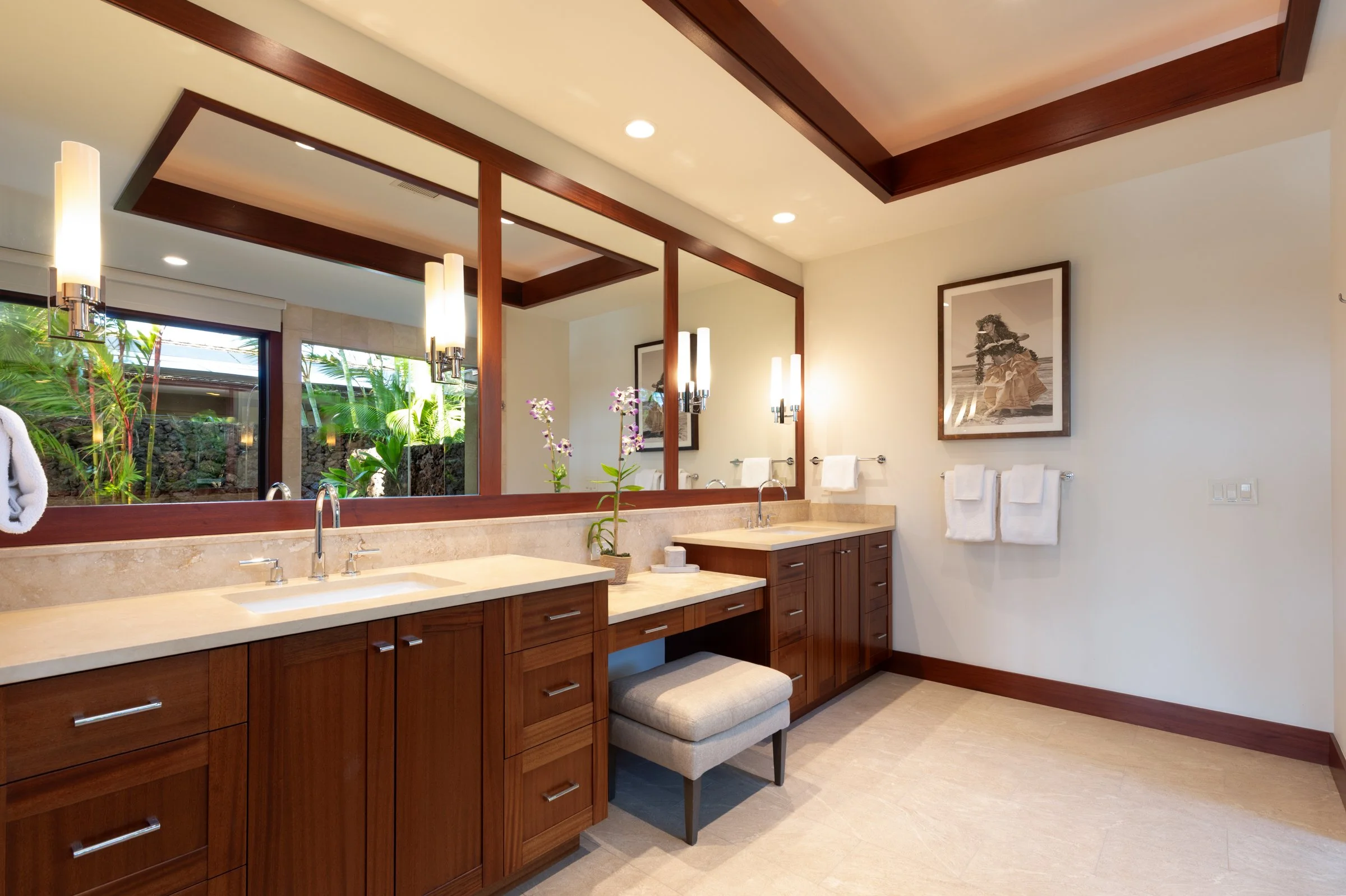 Luxurious primary bathroom features dual walk-in closets, dual vanities, soaking tub and shower. 