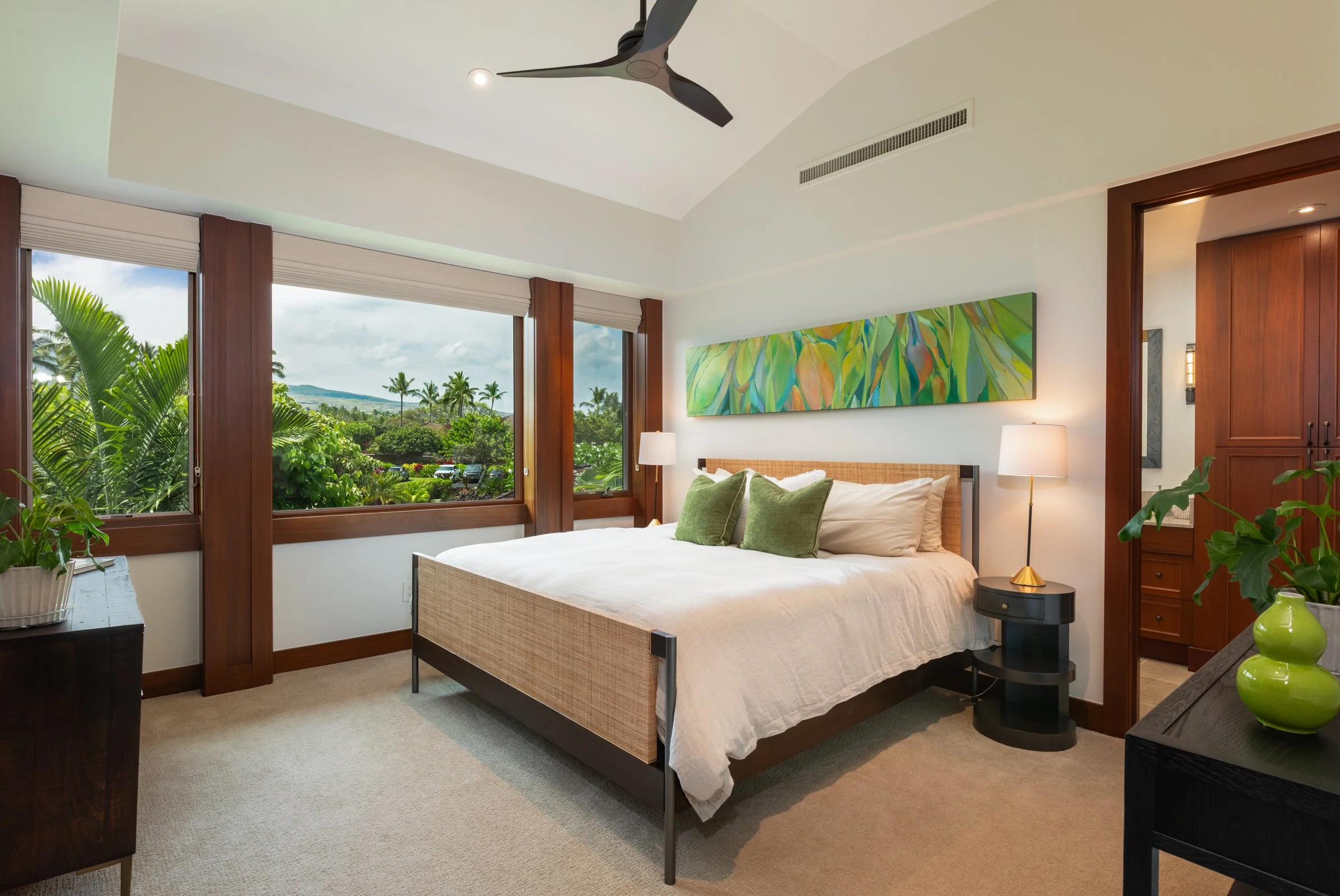 3rd bedroom ensuite features large windows that open to cool breezes, lush treetop views and morning sunrises.