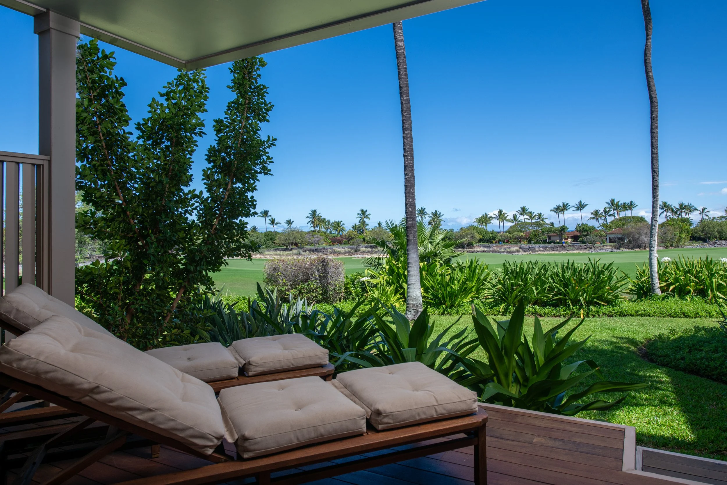 Enjoy clear blue skies and stunning golf course views. Ideal spot to watch the annual  Mitsubishi Electric golf tournament right from your lanai.