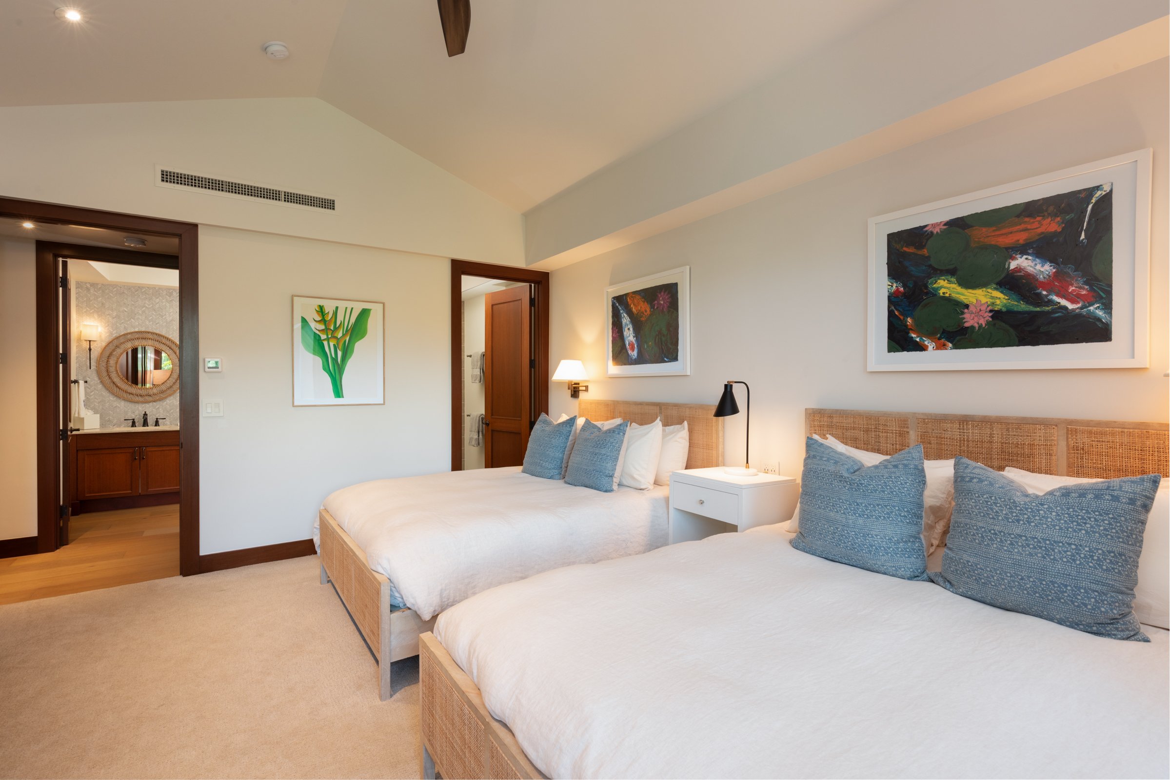 2nd bedroom ensuite enjoys garden views through large windows.