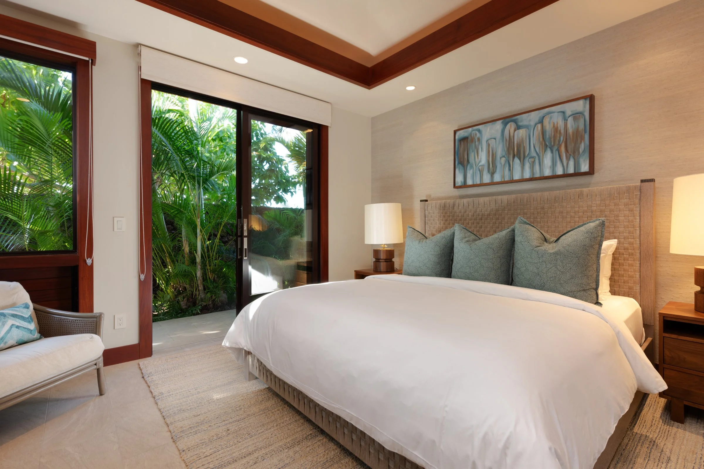 Third guest bedroom showcases full bathroom, private garden lanāi and an outdoor shower garden.