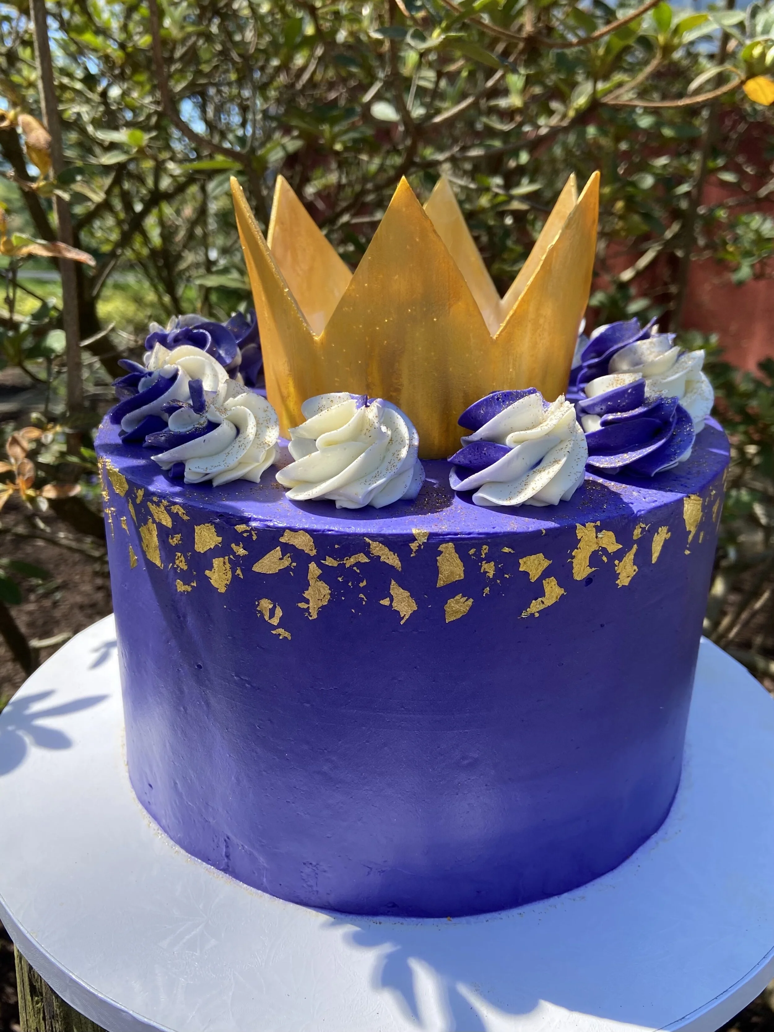 Meant for a Queen! Chocolate cake, espresso syrup and vanilla buttercream single 8" cake for a purple and gold birthday!