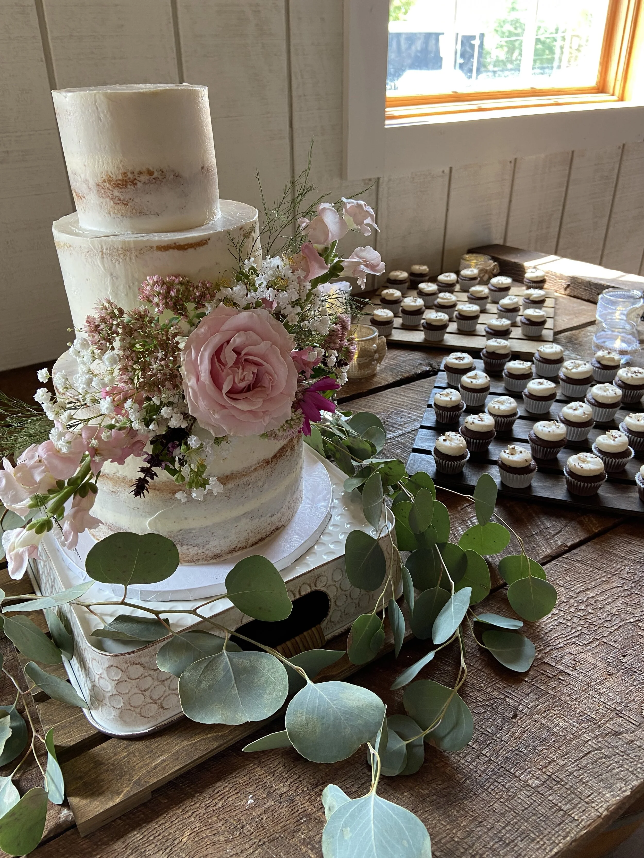 Accompanied with the wedding cake were 75 mini chocolate cupcakes with salted caramel buttercream. 