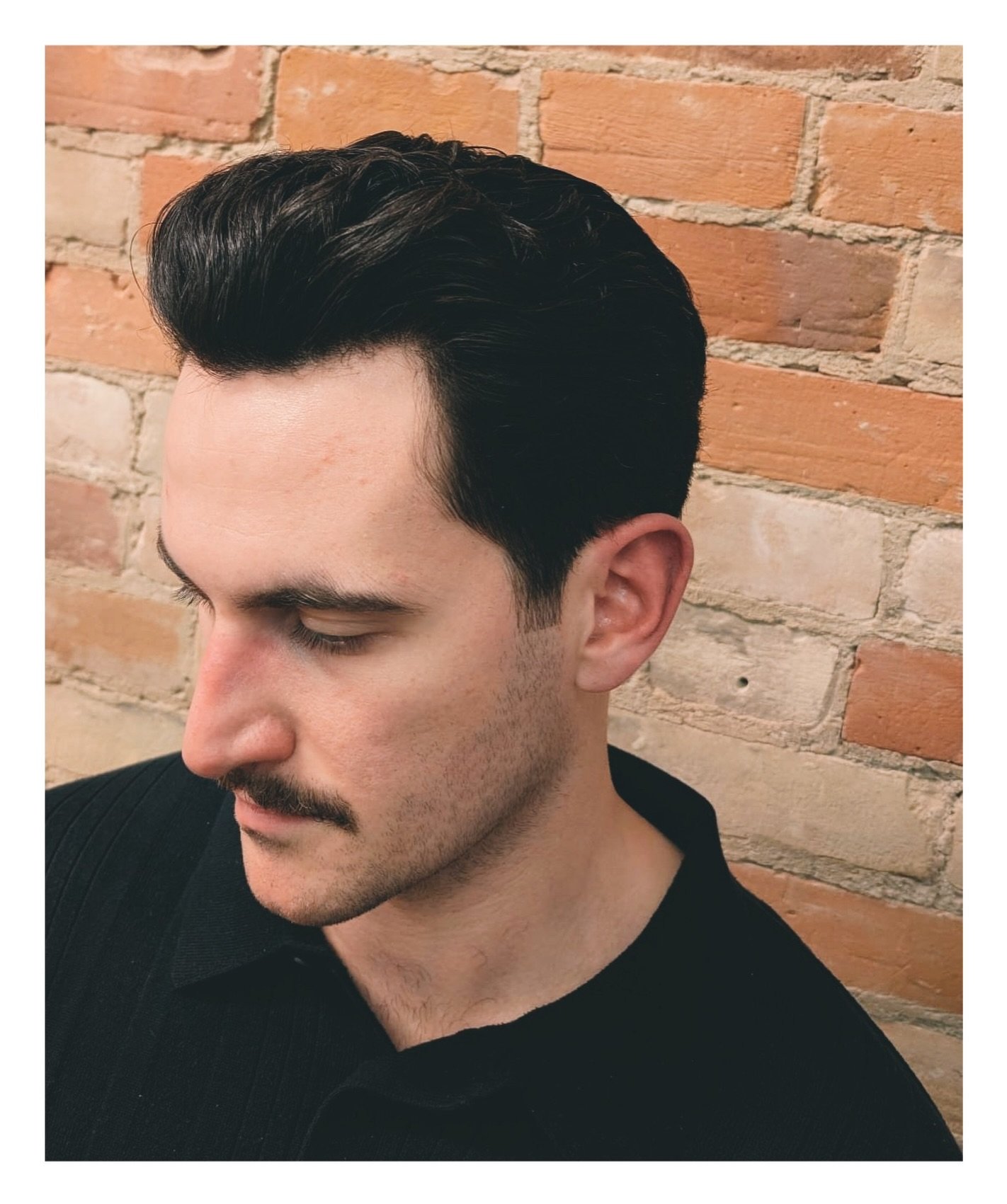 This haircut is where timeless style meets modern structure. The shape builds height in the front and moves naturally through the top&mdash;perfect for guys who want to look sharp without looking &ldquo;too done.&rdquo;
 A well-sculpted pompadour giv