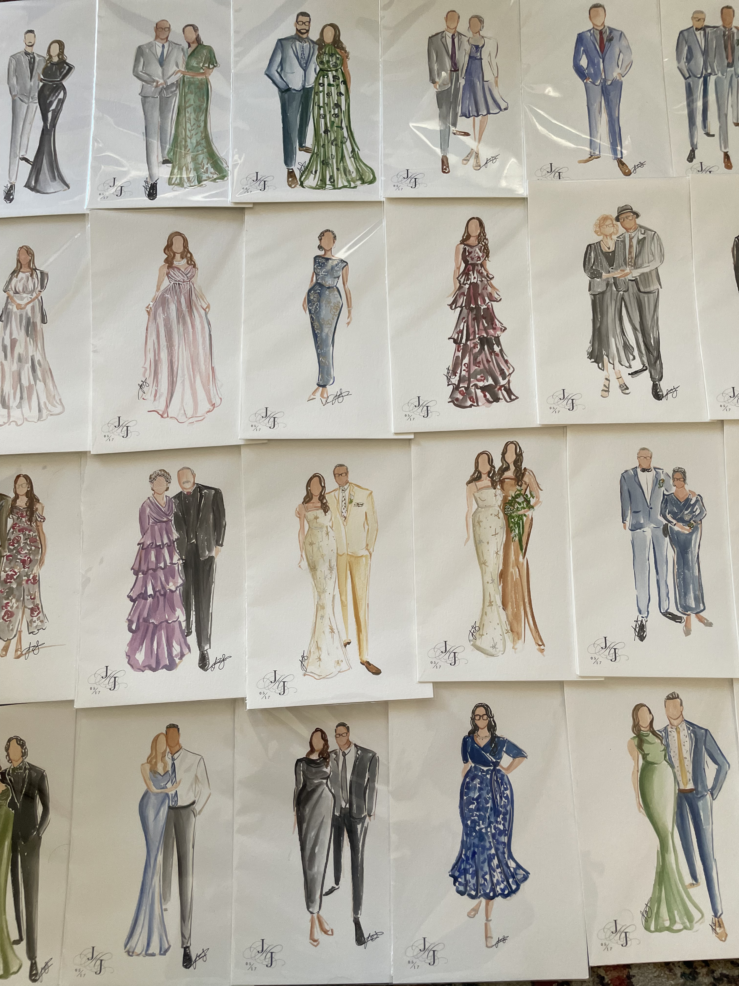 Collection of fashion illustration prints depicting various elegant evening wear and formal outfits with diverse styles, colors, and designs.