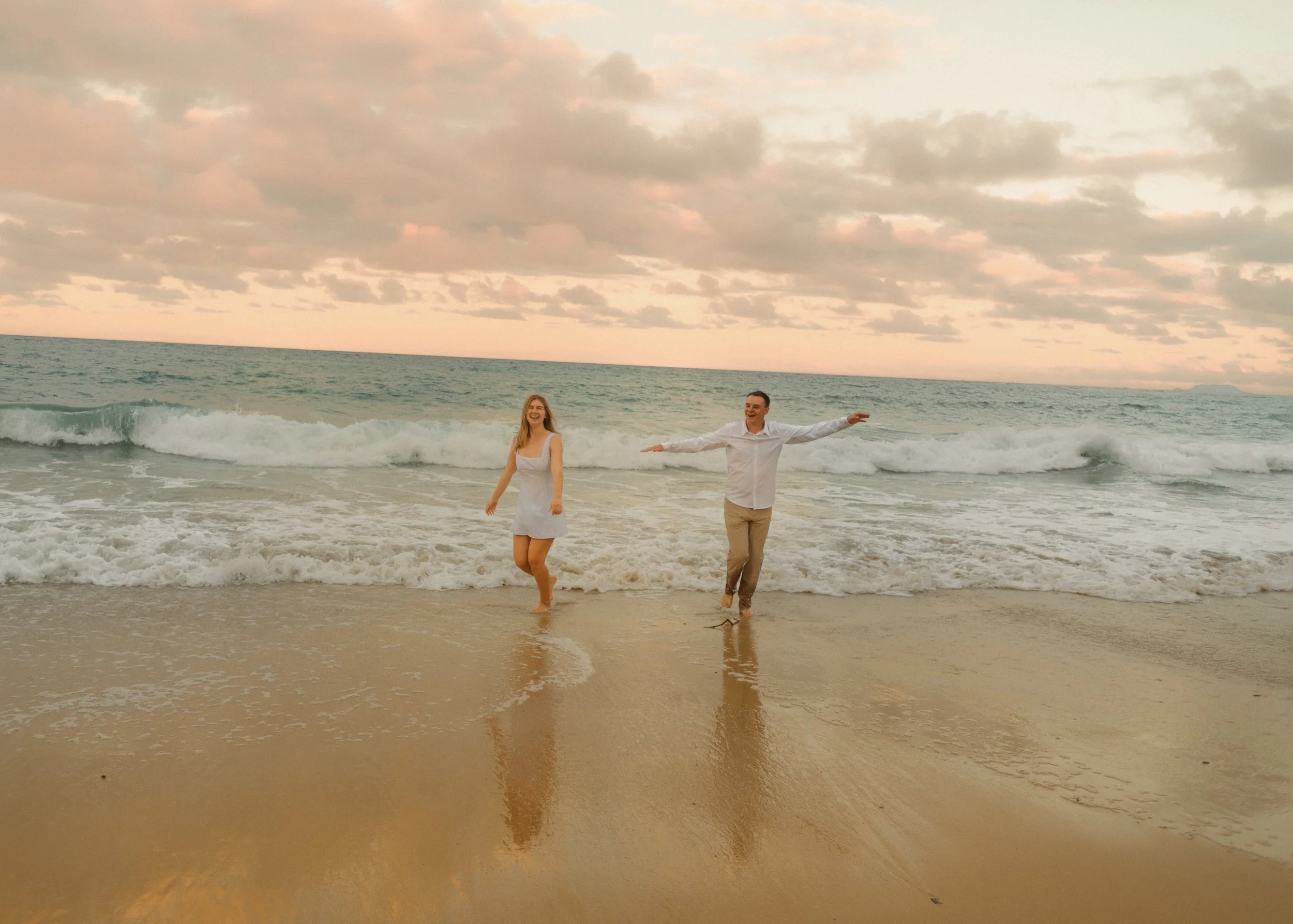 oahu engagement photos at sunset on a beach, colorful film couples photographer, isirie, north shore oahu