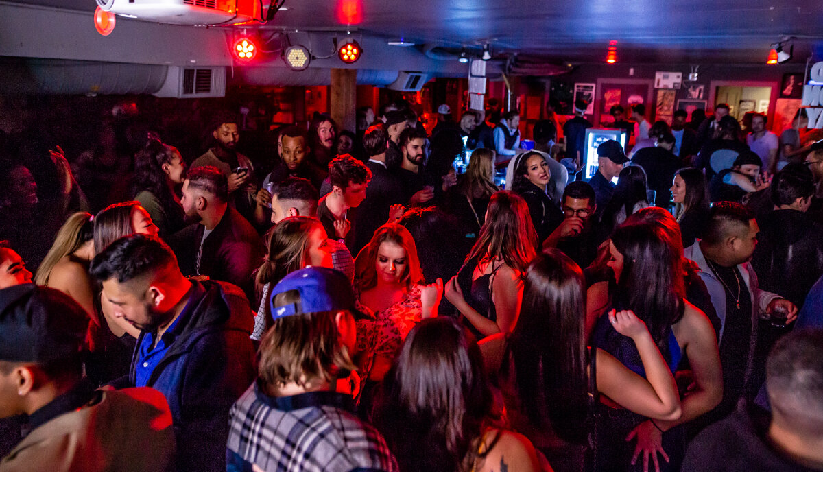 Packed club of guests at the brand activation for Red Monday in Whistler, Canada