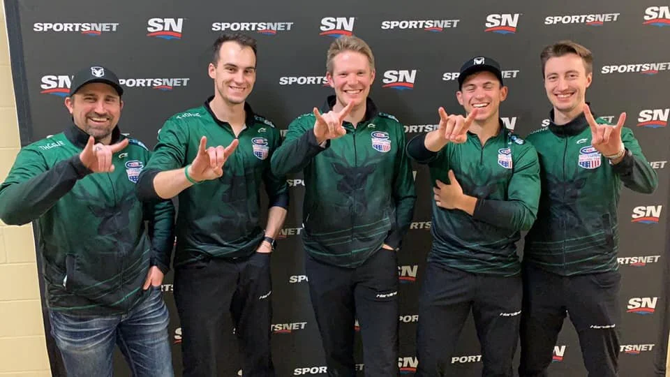 group-showing-sign.jpg