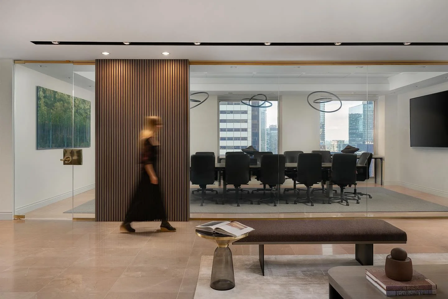 Designing this space was all about coordination, from aligning lighting and technology with the electrical engineer and AV consultant to working these details into a clean and modern design. 

Some of my favourite features are the custom boardroom ta