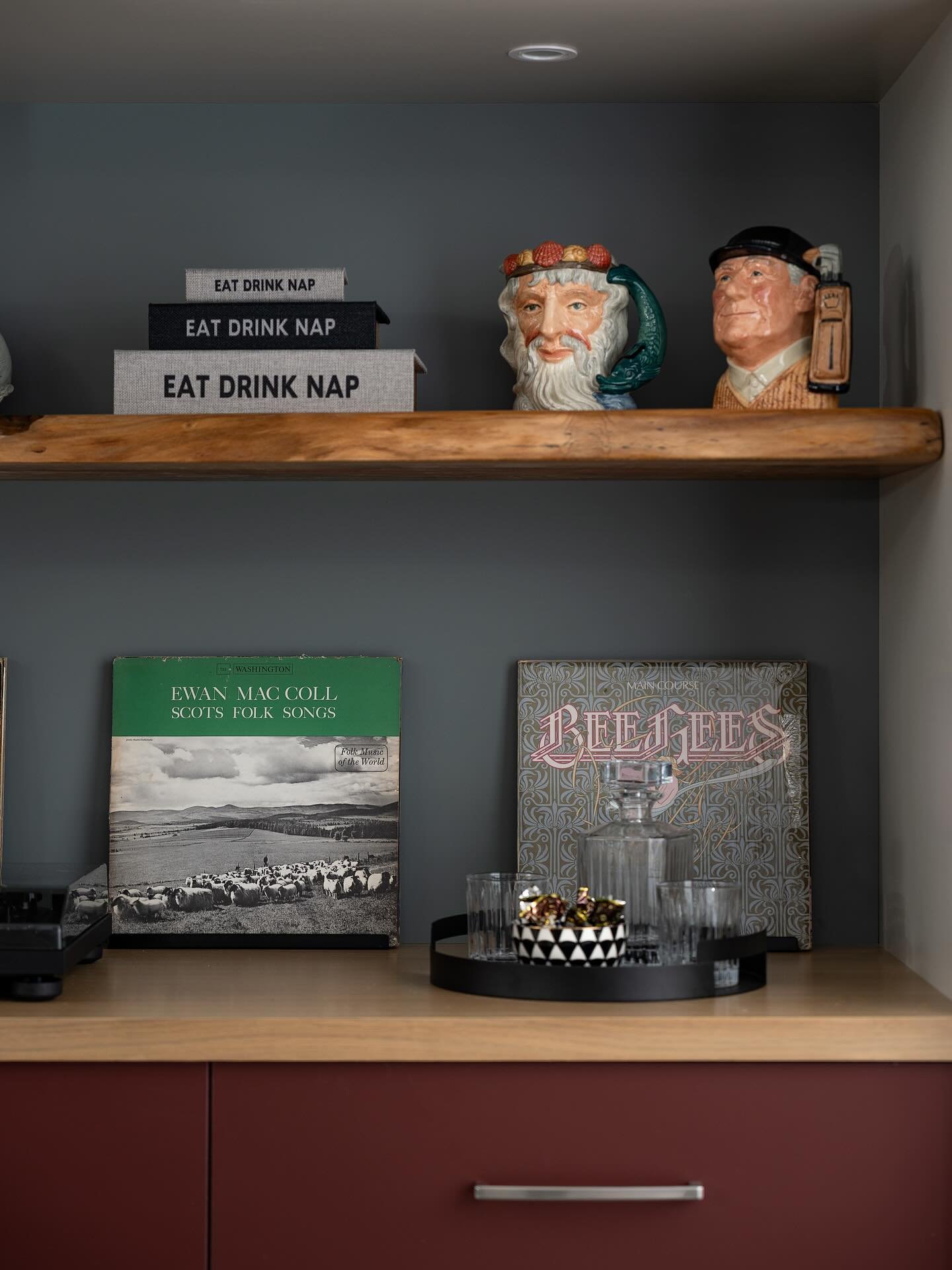 Personal touches make all the difference!
This custom built-in unit was designed specifically for the client - to fit in size, finish, and function - then styled with personal pieces that reflect their passions and memories.
It&rsquo;s those meaningf