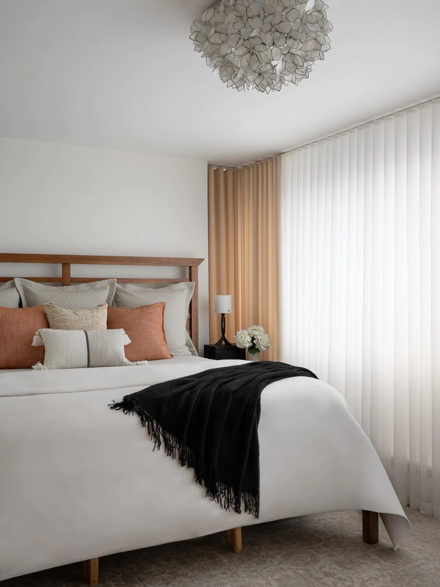 A primary bedroom designed for rest and simplicity!
Custom drapery, soft layered bedding, and thoughtful lighting come together to create a calm and comfortable primary bedroom.

Photography by: @danmolinastudio 

#storicadesignstudio #bedroomdesign 