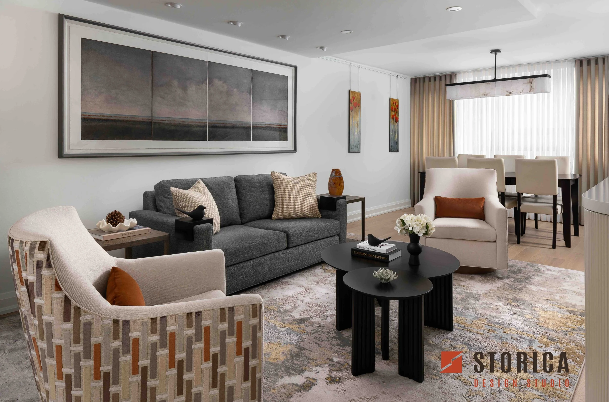 Modern condo living room interior design with neutral palette, contemporary furniture, and open dining area.