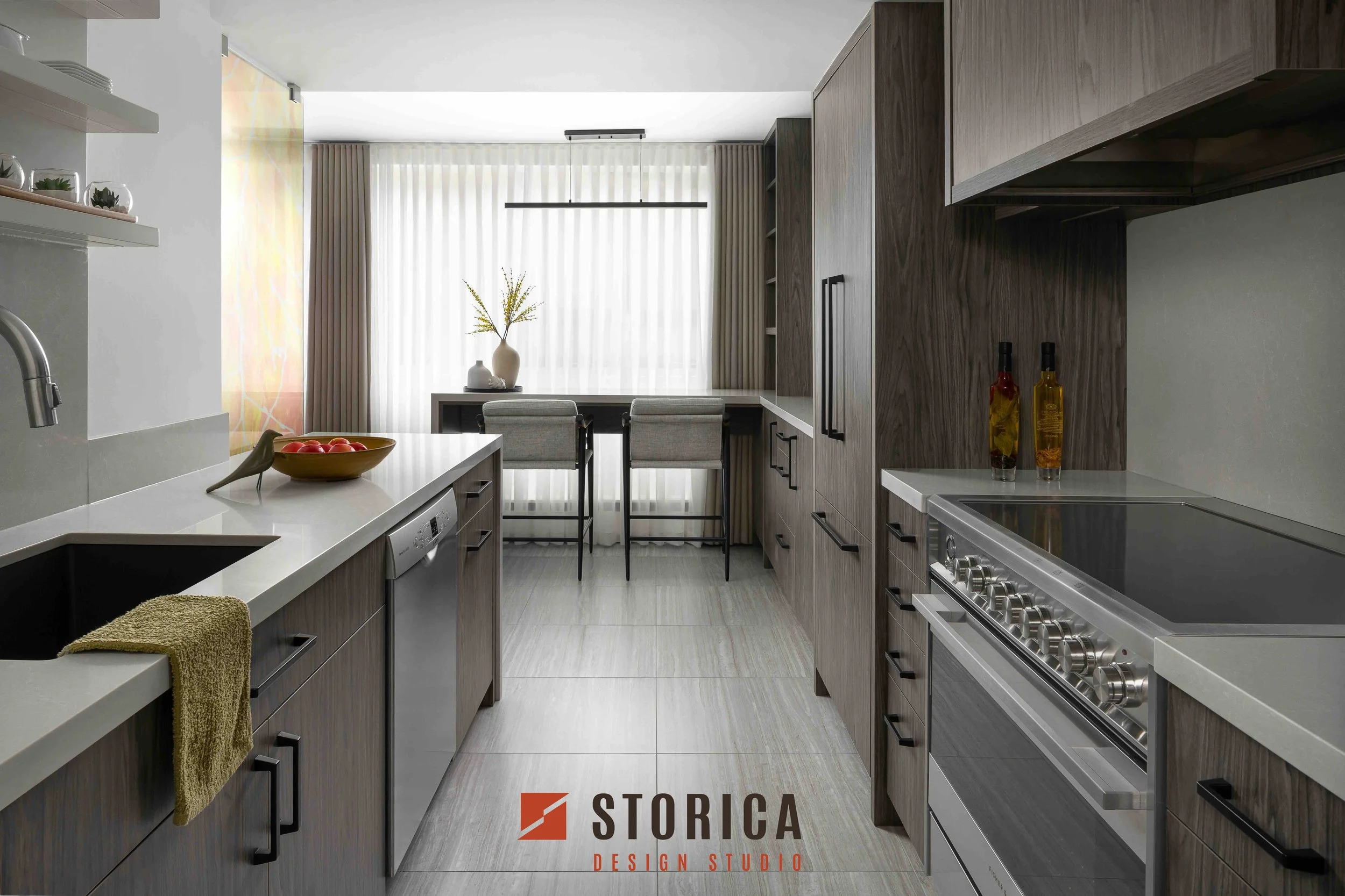 Modern condo galley kitchen with custom cabinetry, quartz countertops, and integrated breakfast bar.