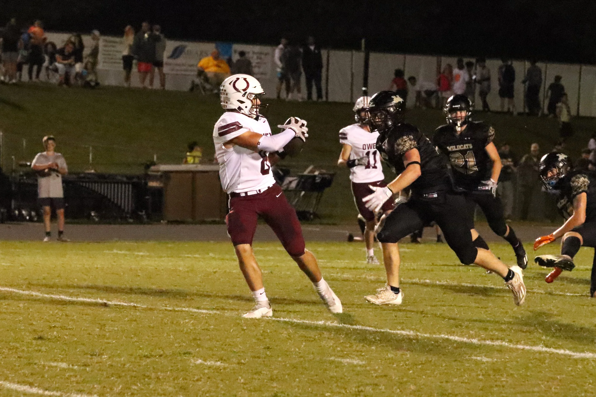 Draughn dominates Owen in conference opener 